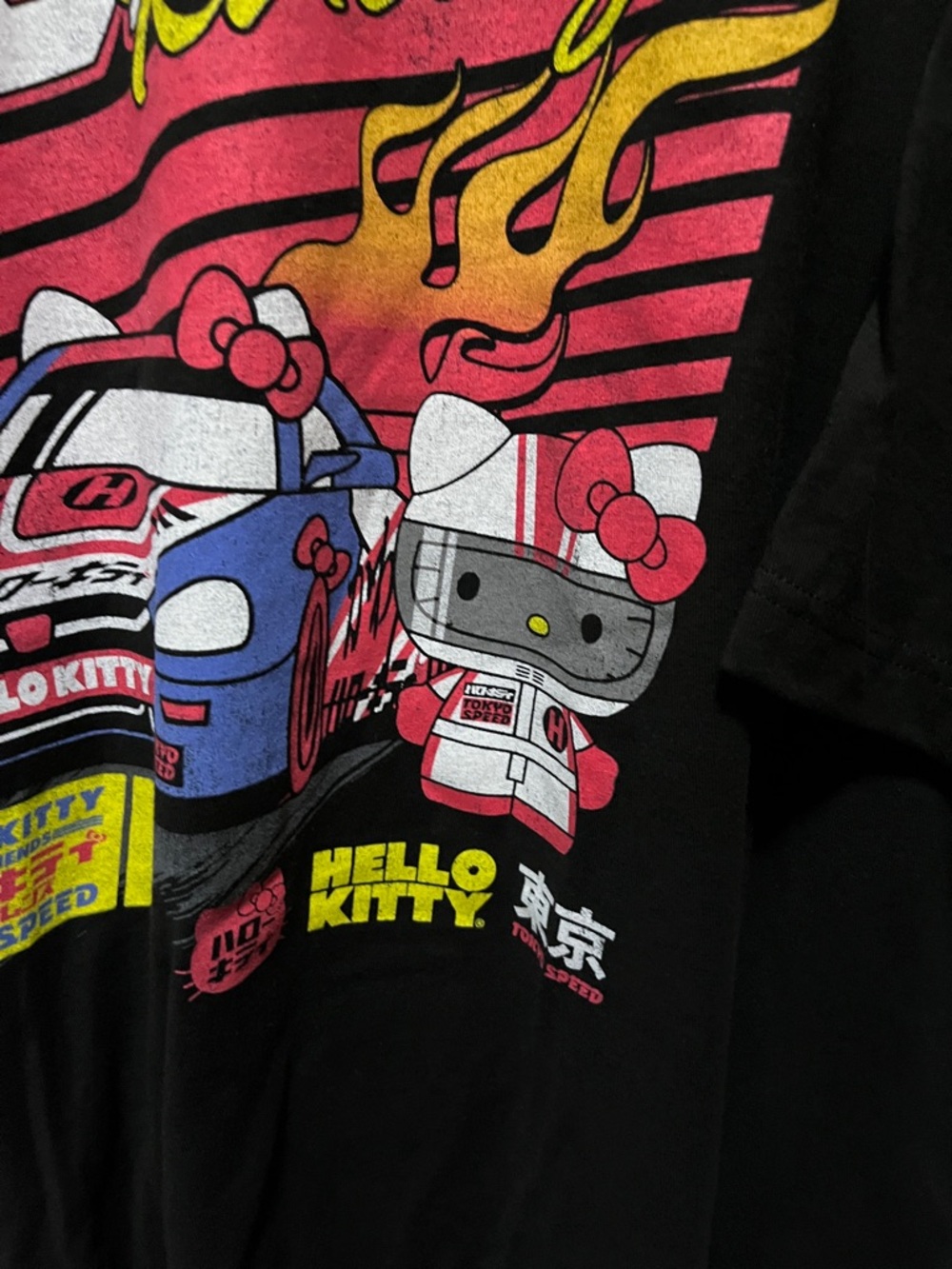 Hello Kitty Black Racing Graphic Tee with Red, Yellow & Blue - Picture 2 of 4
